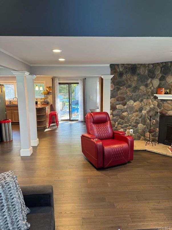 Fireplace, Interior, Recessed Lighting, Stone Walls, Wood Texture Flooring