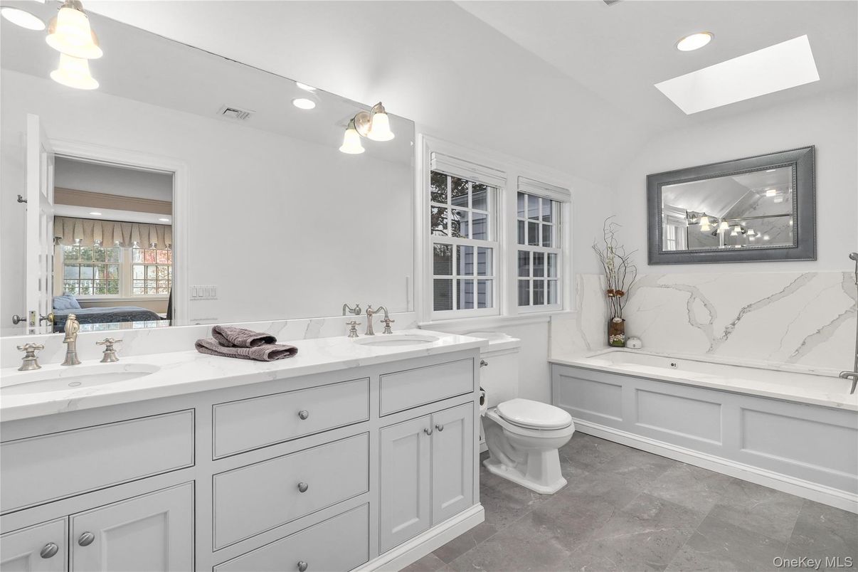Bathroom, Dual Sink Vanities, Interior, Marble Walls, Recessed Lighting