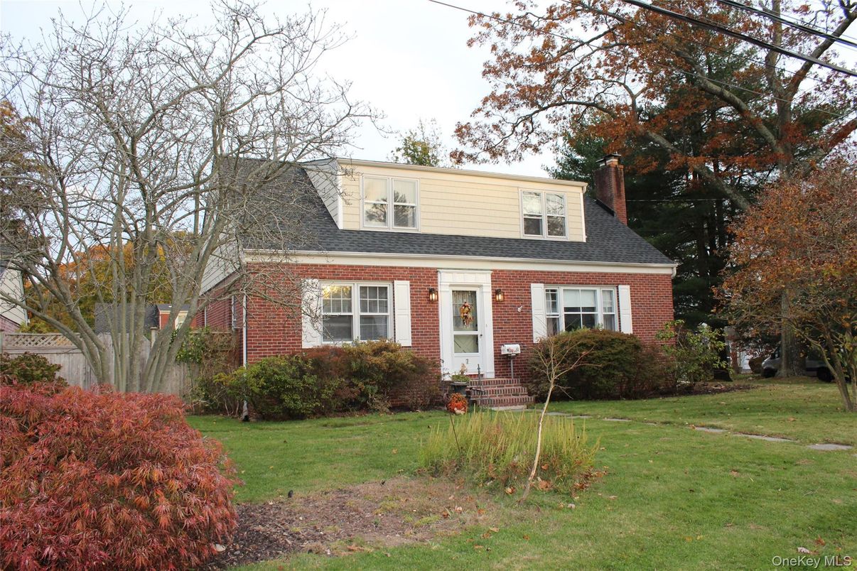 Exterior, Facade, Brick Facade, Cape Cod