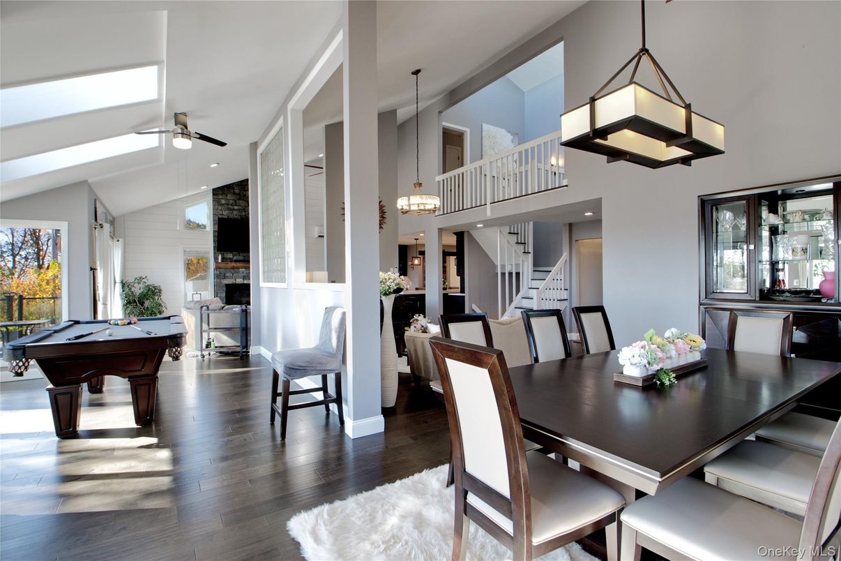 Billiard Table, Chandelier, Dining room, Game Room, Interior, Pendant Lights, Recessed Lighting, Wood Texture Flooring