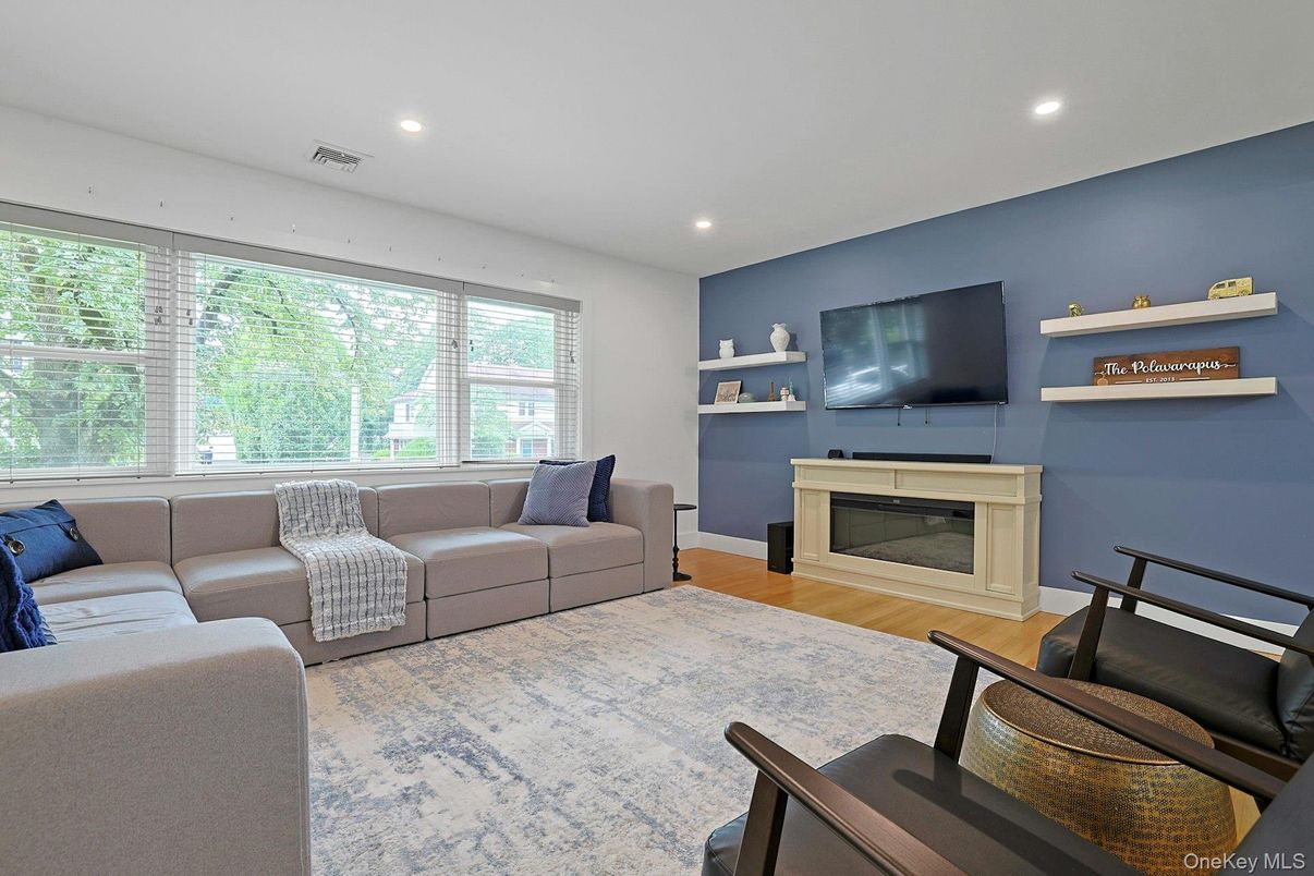 Fireplace, Interior, Living room, Recessed Lighting, Wood Texture Flooring