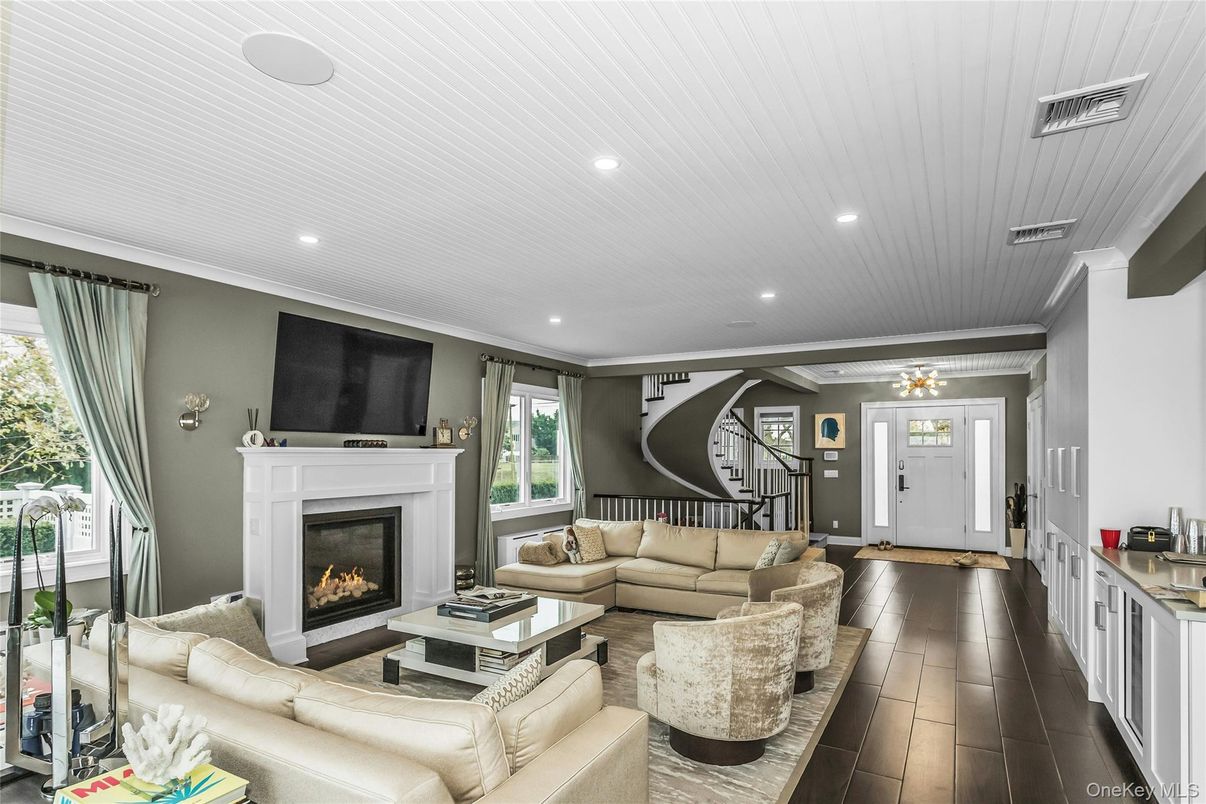 Chandelier, Fireplace, Interior, Living room, Recessed Lighting, Wood Texture Flooring