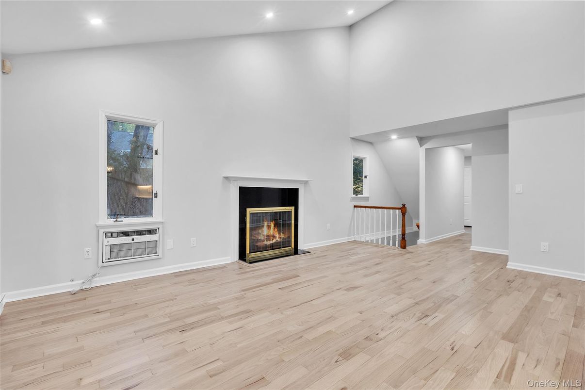 Empty room, Fireplace, Interior, Recessed Lighting, Wood Texture Flooring