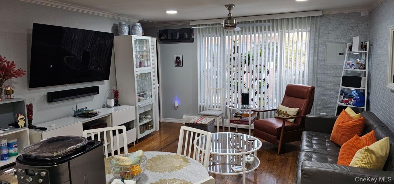 Fireplace, Interior, Living room, Recessed Lighting, Stone Walls, Wood Texture Flooring