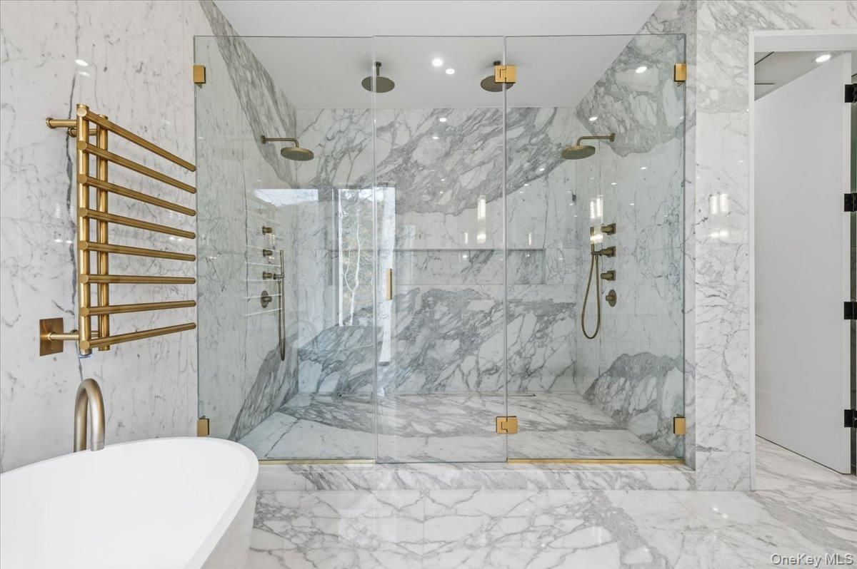 Bathroom, Free Standing Baths, Glass Shower, Interior, Marble, Marble Walls, Recessed Lighting