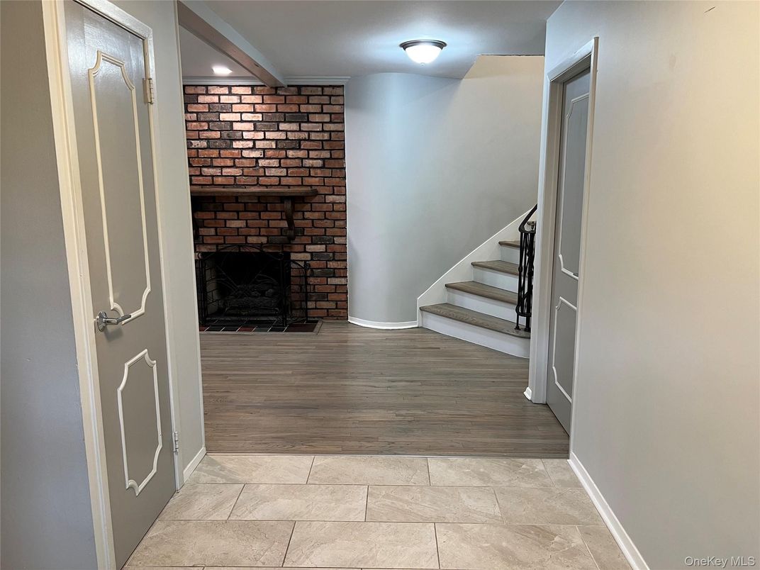 Fireplace, Interior, Recessed Lighting, Stone Walls, Wood Texture Flooring