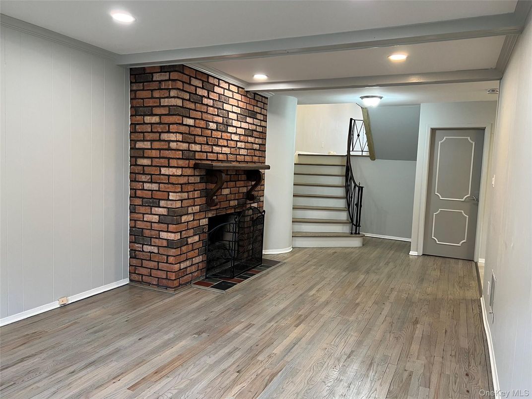 Fireplace, Interior, Recessed Lighting, Stone Walls, Wood Texture Flooring