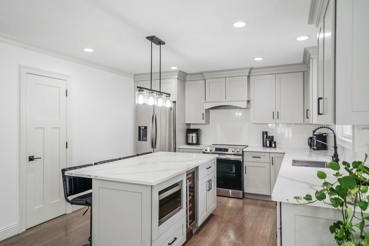 Interior, Kitchen, Pendant Lights, Recessed Lighting, Stainless Steel Appliances, Wood Texture Flooring