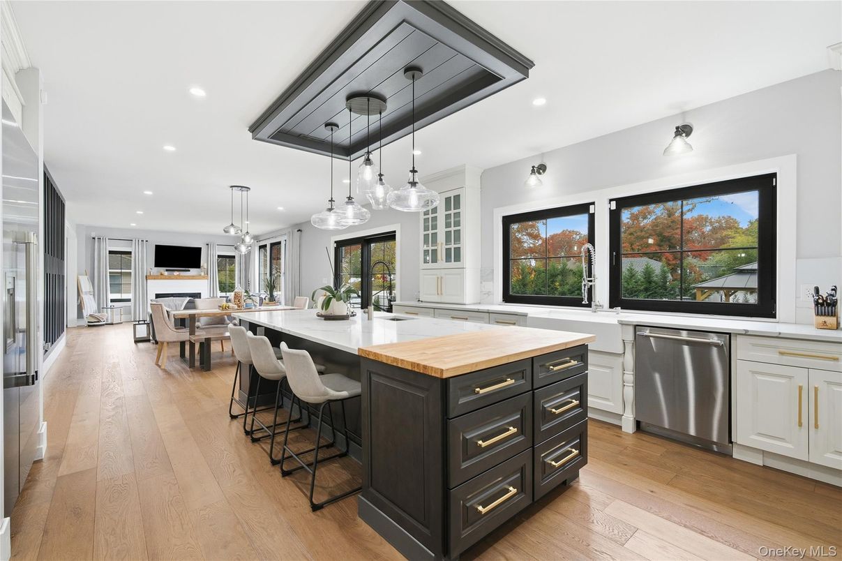 Dining room, Interior, Kitchen, Pendant Lights, Recessed Lighting, Stainless Steel Appliances, Wood Texture Flooring