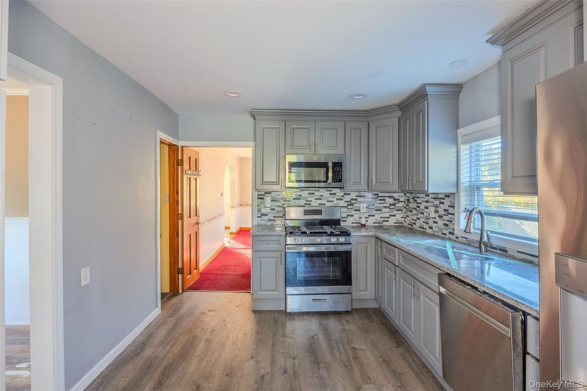 Interior, Kitchen, Recessed Lighting, Stainless Steel Appliances, Wood Texture Flooring