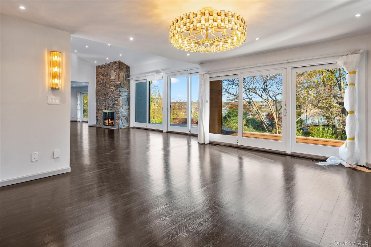 Chandelier, Empty room, Fireplace, Interior, Recessed Lighting, Wood Texture Flooring