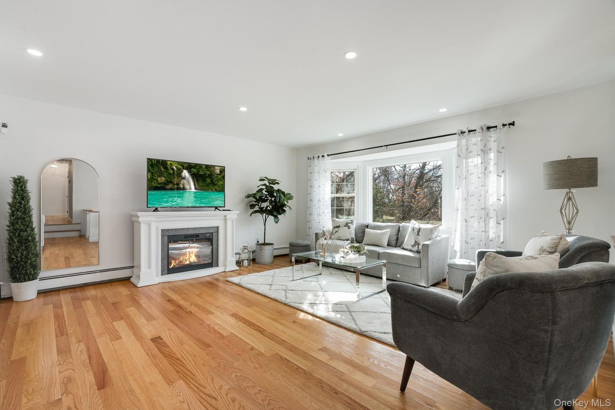 Fireplace, Interior, Living room, Recessed Lighting, Wood Texture Flooring