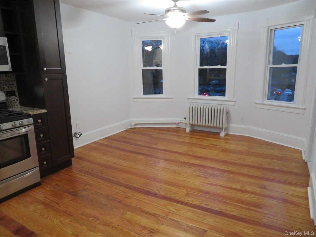 Empty room, Interior, Kitchen, Stainless Steel Appliances, Wood Texture Flooring