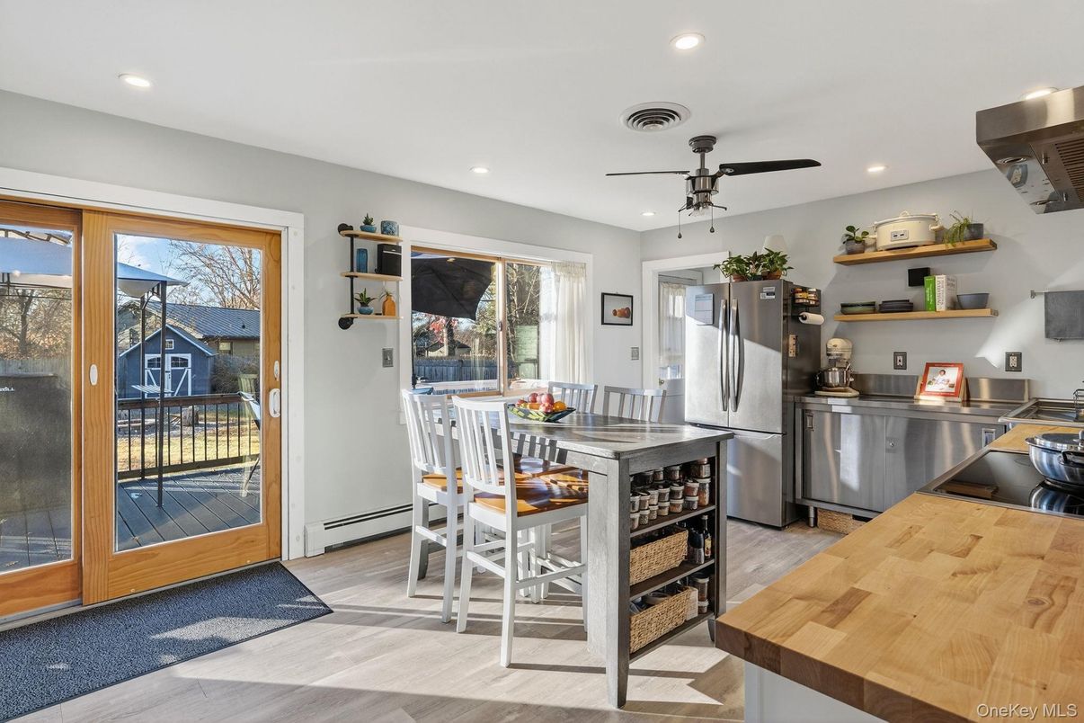 Dining room, Interior, Kitchen, Recessed Lighting, Stainless Steel Appliances, Wood Texture Flooring