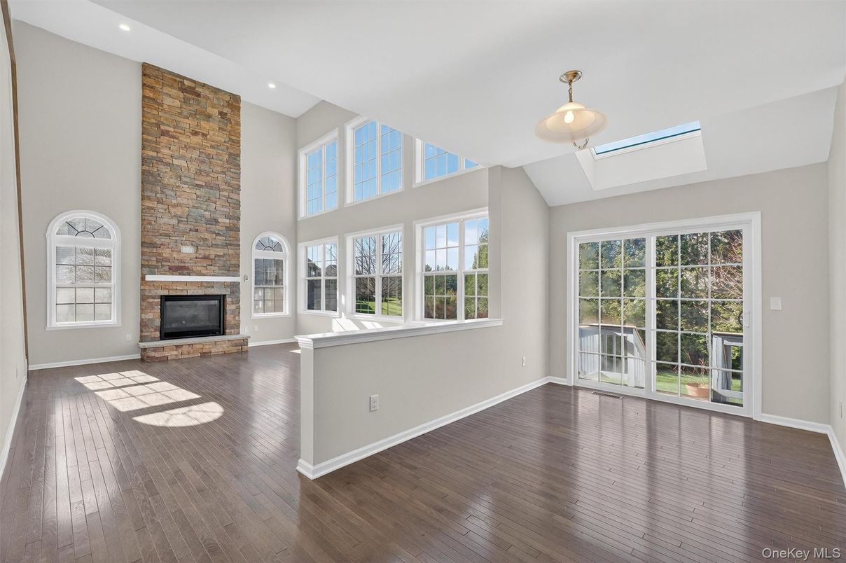 Fireplace, Interior, Recessed Lighting, Stone Walls, Wood Texture Flooring