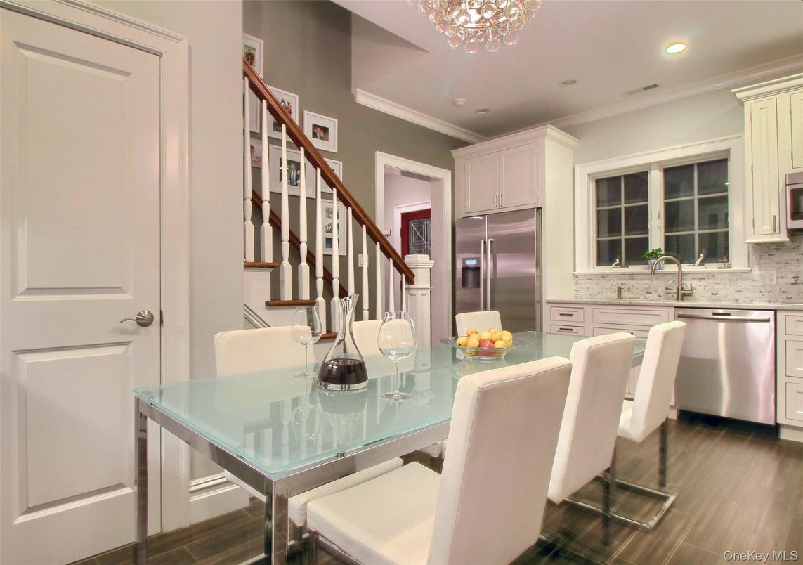 Dining room, Interior, Kitchen, Recessed Lighting, Stainless Steel Appliances, Wood Texture Flooring