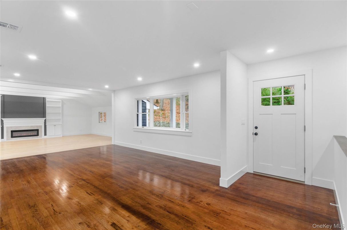 Empty room, Fireplace, Interior, Recessed Lighting, Wood Texture Flooring