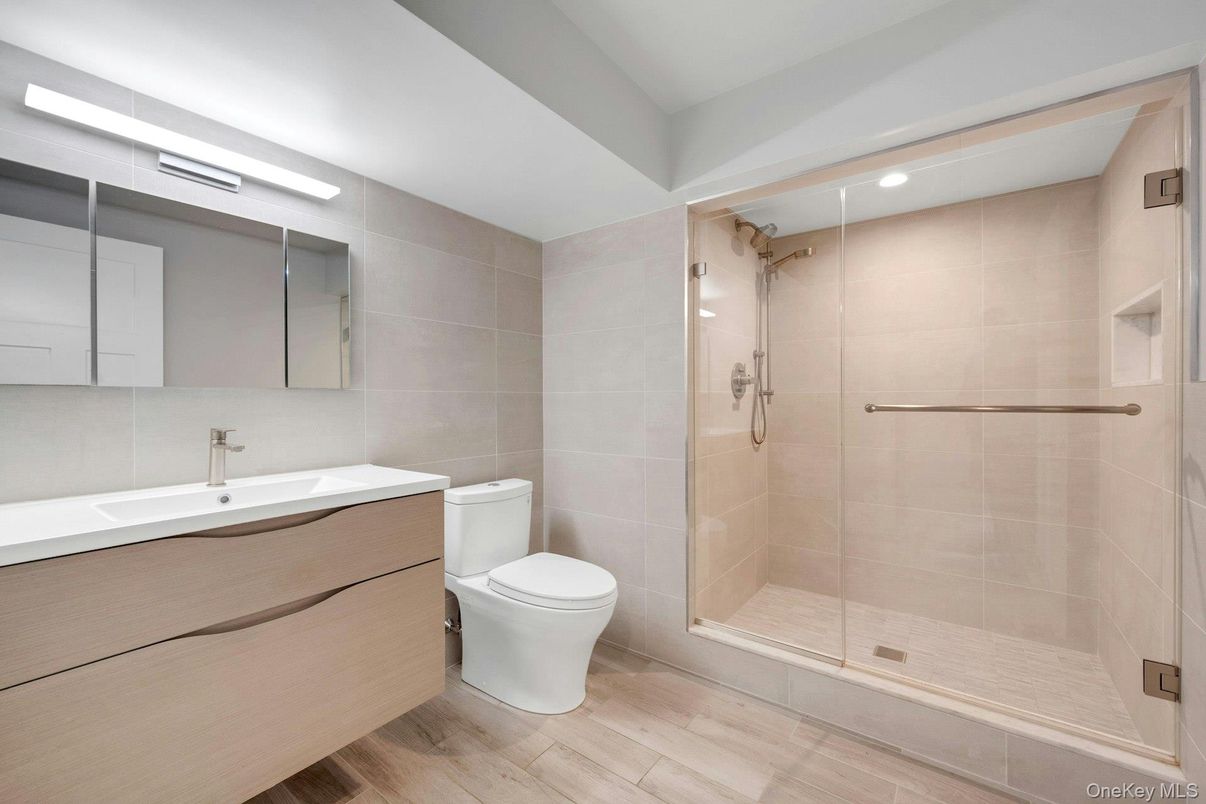 Bathroom, Glass Shower, Interior, Recessed Lighting, Wood Texture Flooring