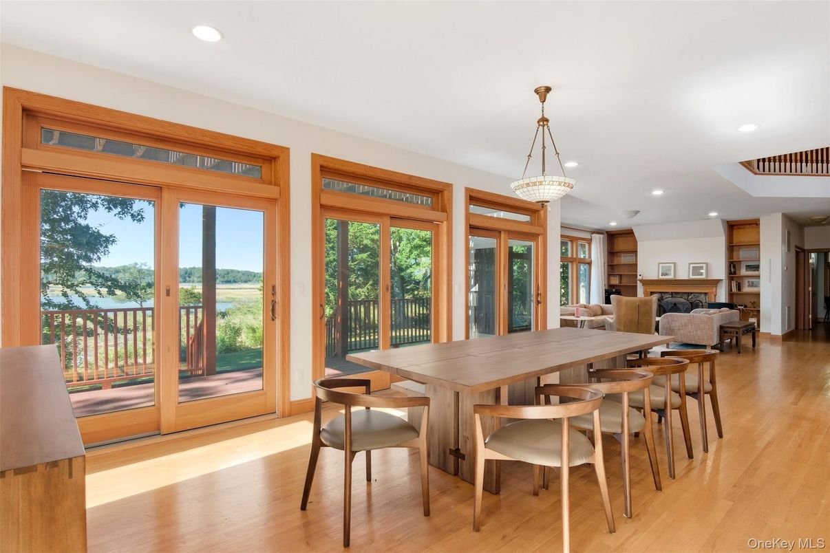 Dining room, Fireplace, Interior, Living room, Recessed Lighting, Wood Texture Flooring
