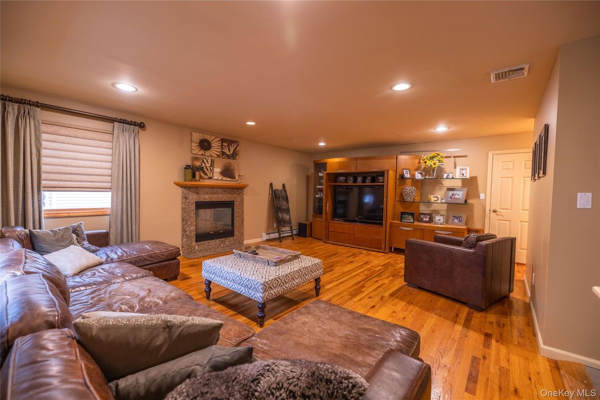 Fireplace, Interior, Living room, Recessed Lighting, Wood Texture Flooring