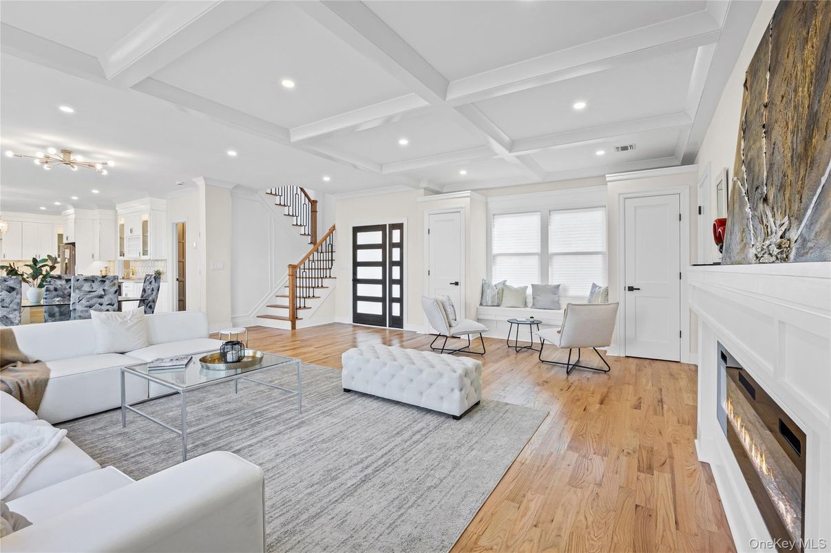 Dining room, Fireplace, Interior, Living room, Recessed Lighting, Wood Texture Flooring