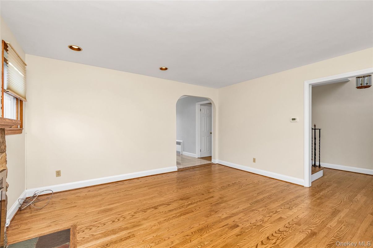 Empty room, Fireplace, Interior, Recessed Lighting, Wood Texture Flooring