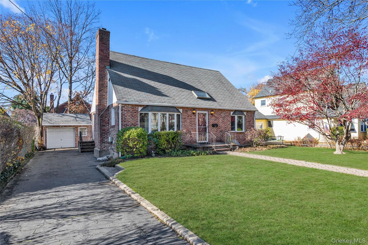 Backyard, Detached Garage, Exterior, Facade, Brick Facade, Cape Cod
