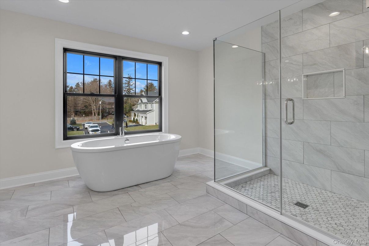 Bathroom, Free Standing Baths, Glass Shower, Interior, Marble, Marble Walls, Recessed Lighting