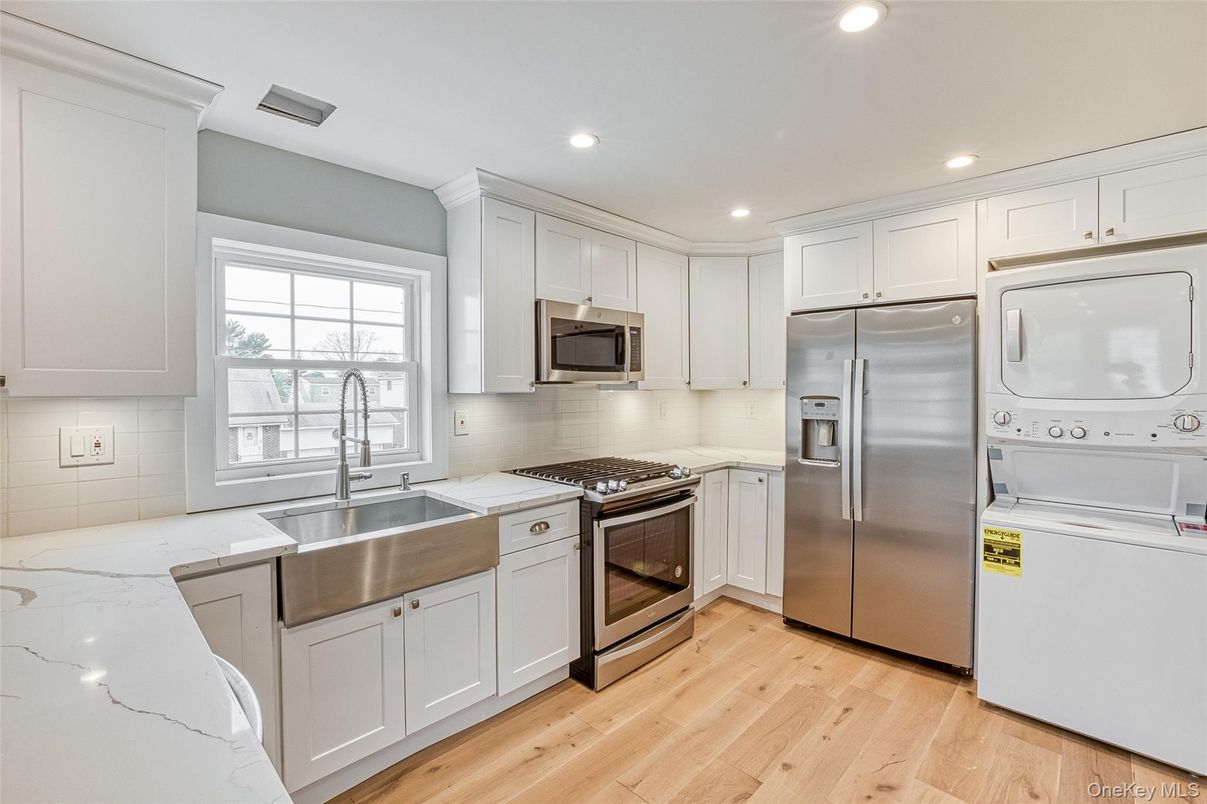 Interior, Kitchen, Recessed Lighting, Stainless Steel Appliances, Washer, Wood Texture Flooring