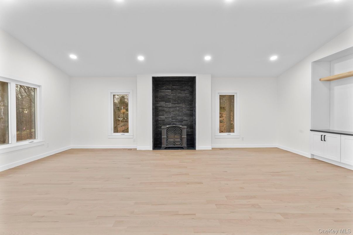 Empty room, Fireplace, Interior, Recessed Lighting, Wood Texture Flooring