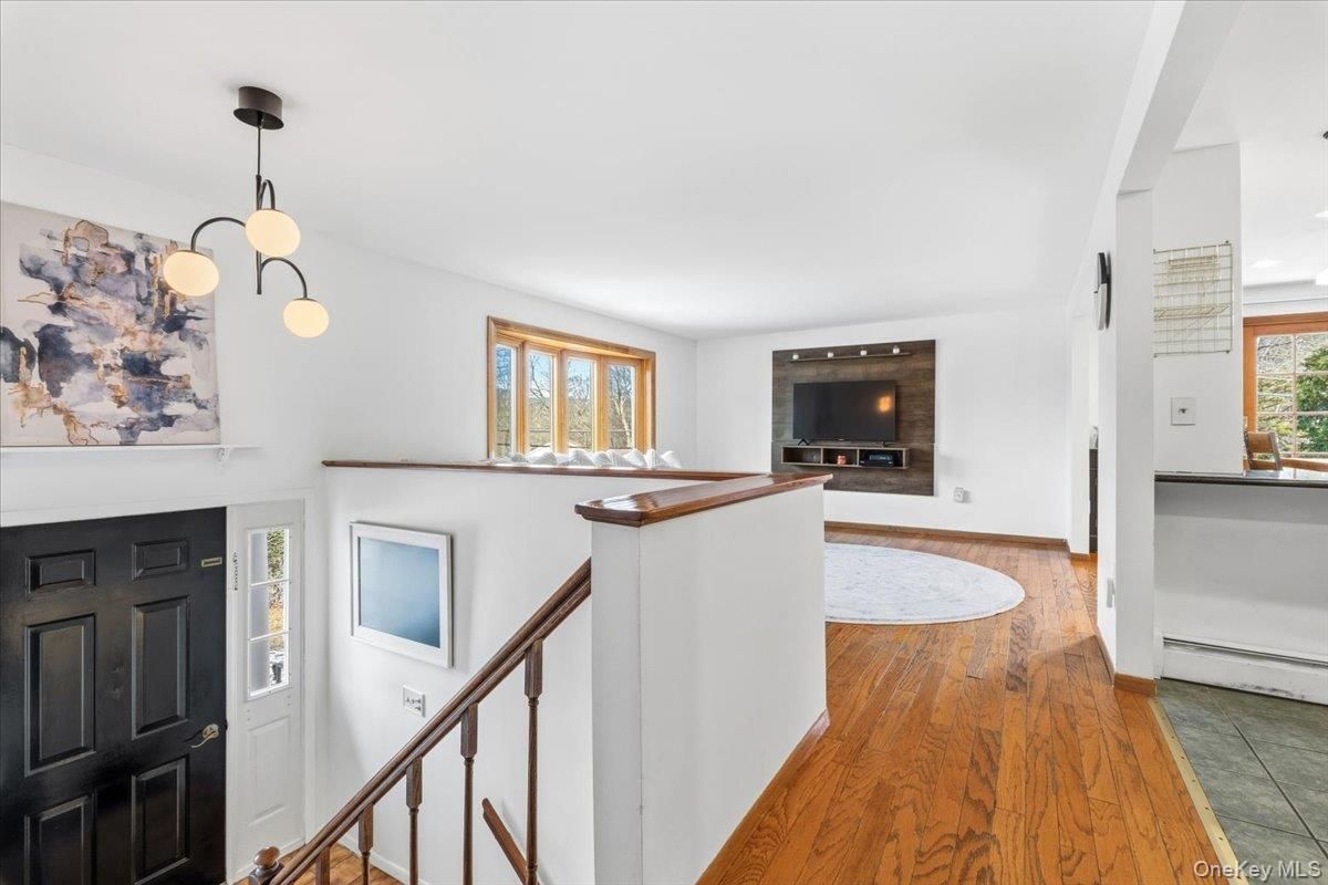 Fireplace, Interior, Pendant Lights, Recessed Lighting, Wood Texture Flooring