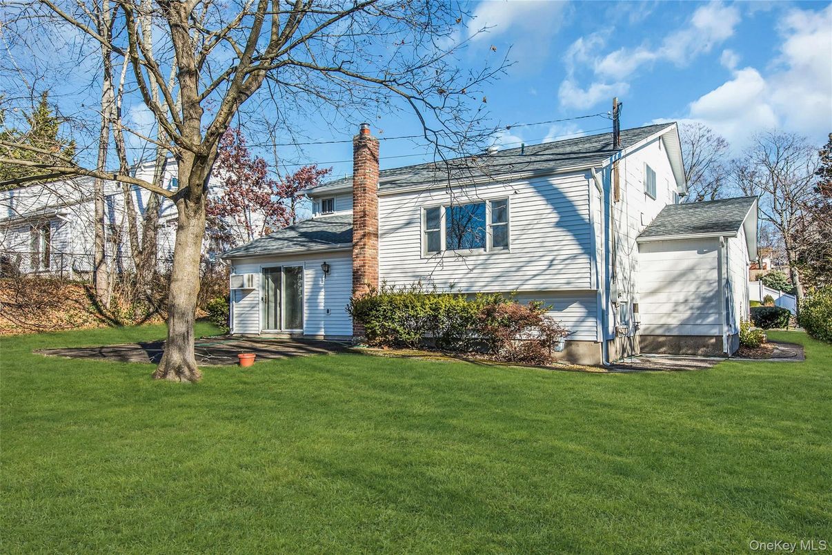 Attached, Backyard, Exterior, Facade, Raised Ranch