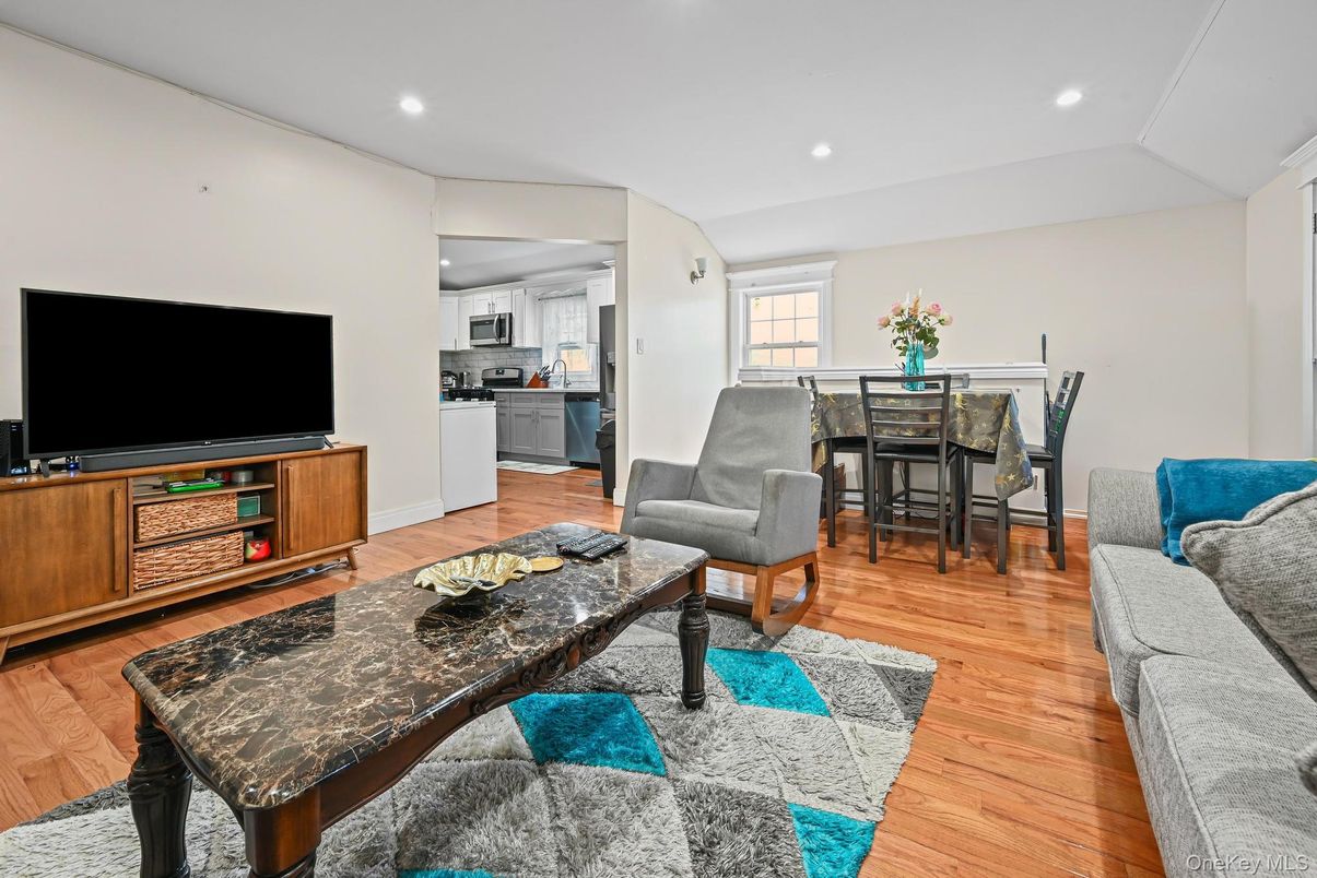 Dining room, Interior, Kitchen, Living room, Recessed Lighting, Stainless Steel Appliances, Wood Texture Flooring