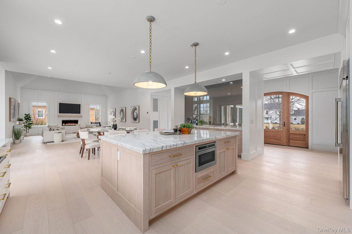 Dining room, Fireplace, Interior, Kitchen, Living room, Pendant Lights, Recessed Lighting, Wood Texture Flooring