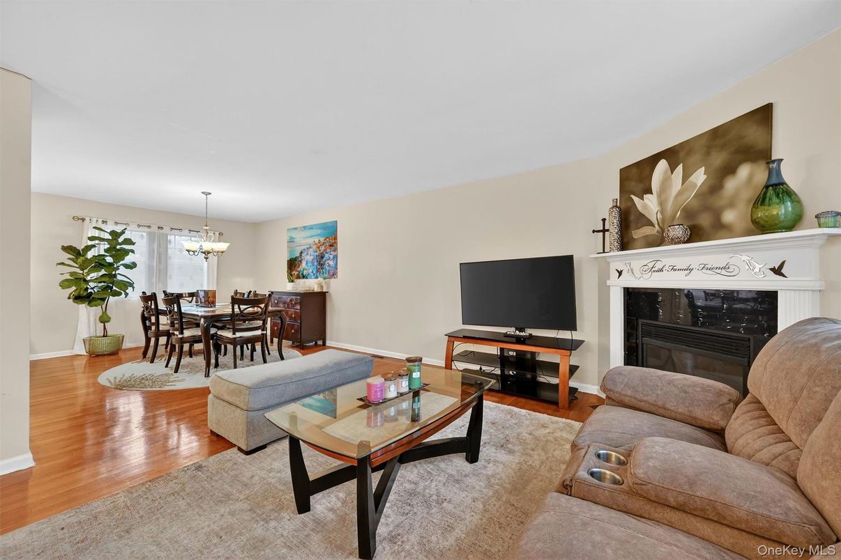 Chandelier, Dining room, Fireplace, Interior, Living room, Wood Texture Flooring