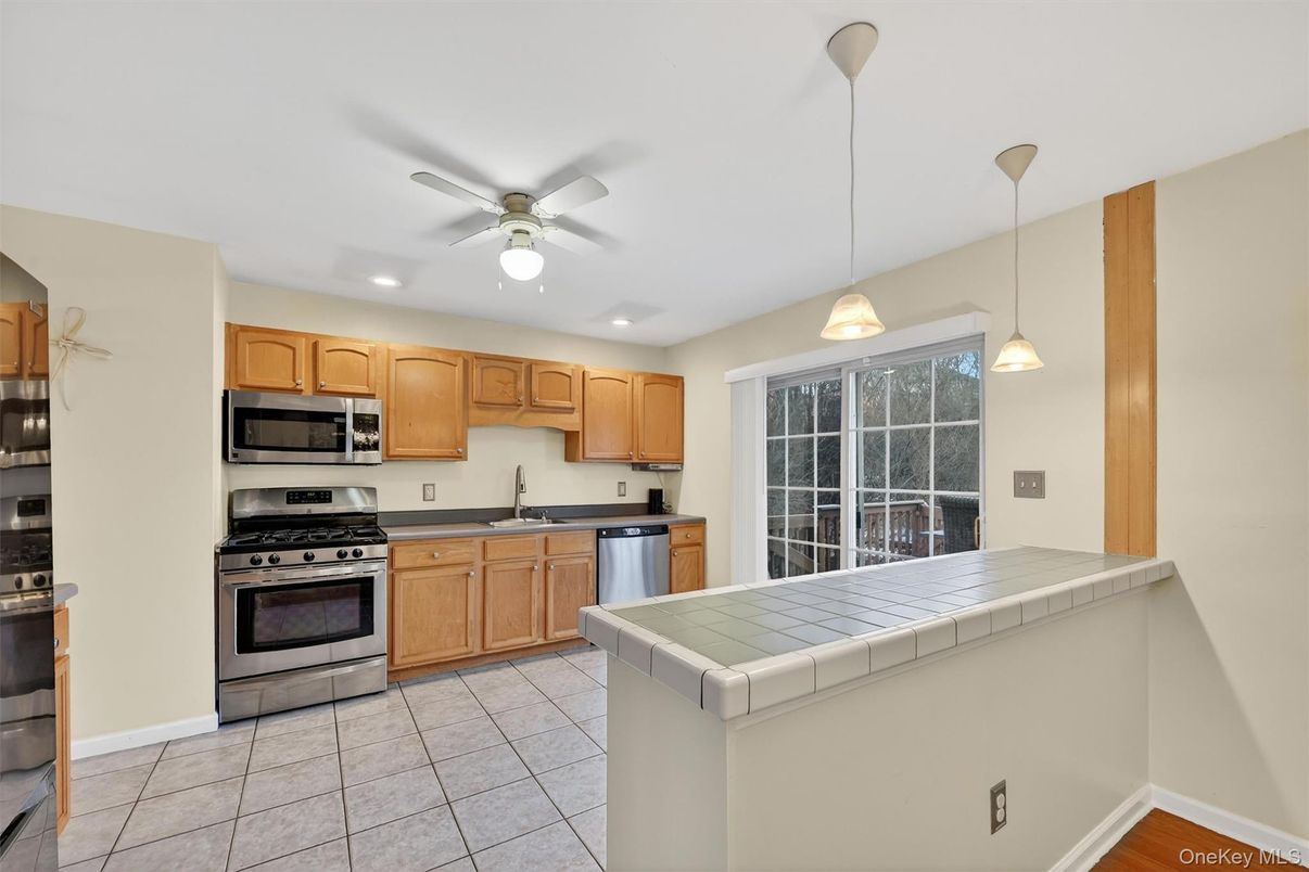 Interior, Kitchen, Pendant Lights, Recessed Lighting, Stainless Steel Appliances, Tile Countertops