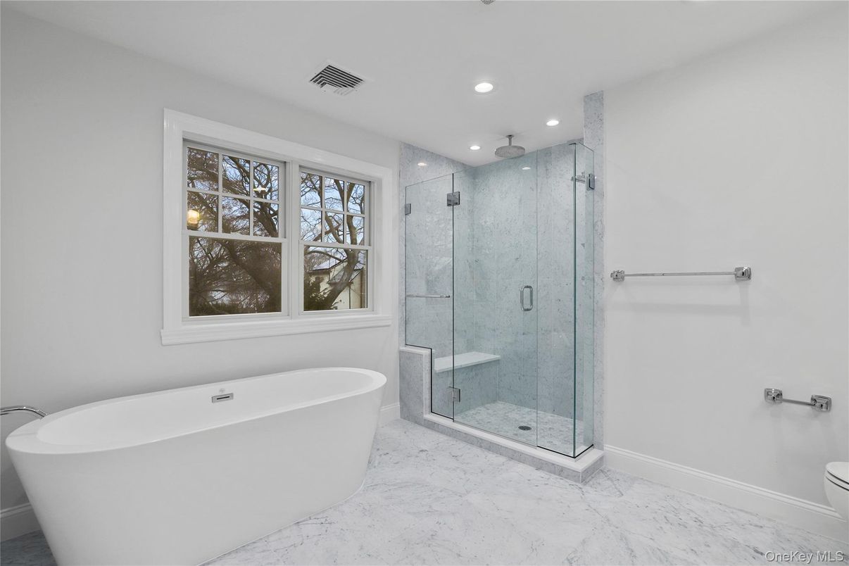 Bathroom, Free Standing Baths, Glass Shower, Interior, Marble, Marble Walls, Recessed Lighting