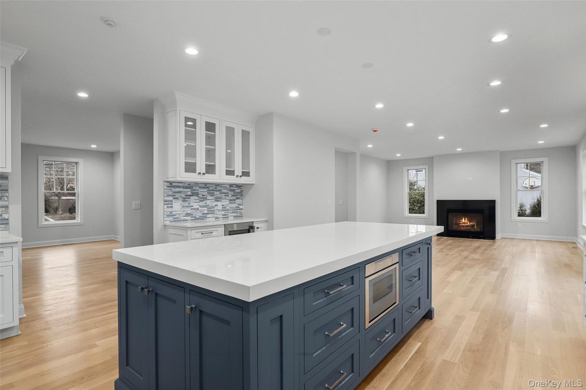 Fireplace, Interior, Kitchen, Recessed Lighting, Wood Texture Flooring