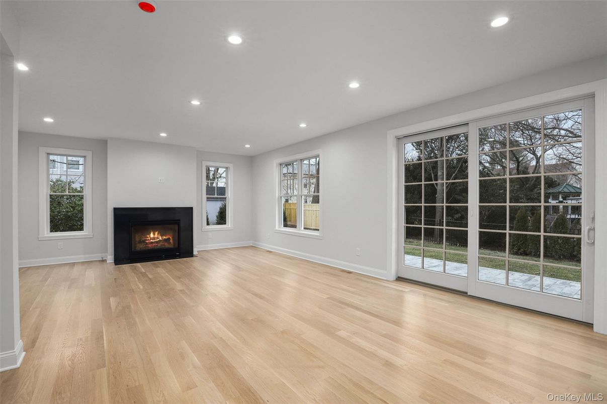 Empty room, Fireplace, Interior, Recessed Lighting, Wood Texture Flooring