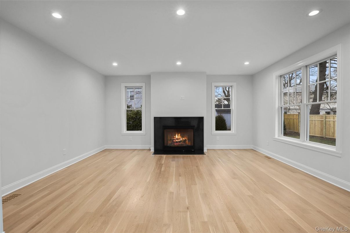 Empty room, Fireplace, Interior, Recessed Lighting, Wood Texture Flooring