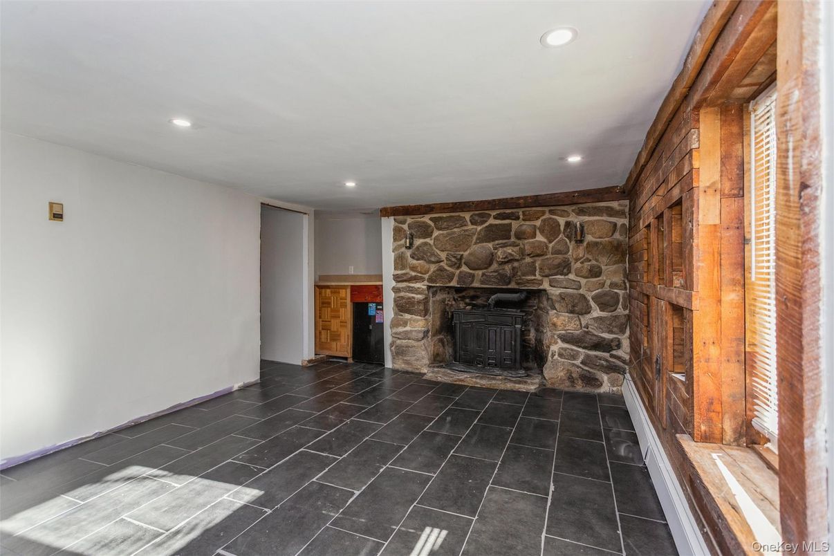 Empty room, Fireplace, Interior, Recessed Lighting, Stone Walls