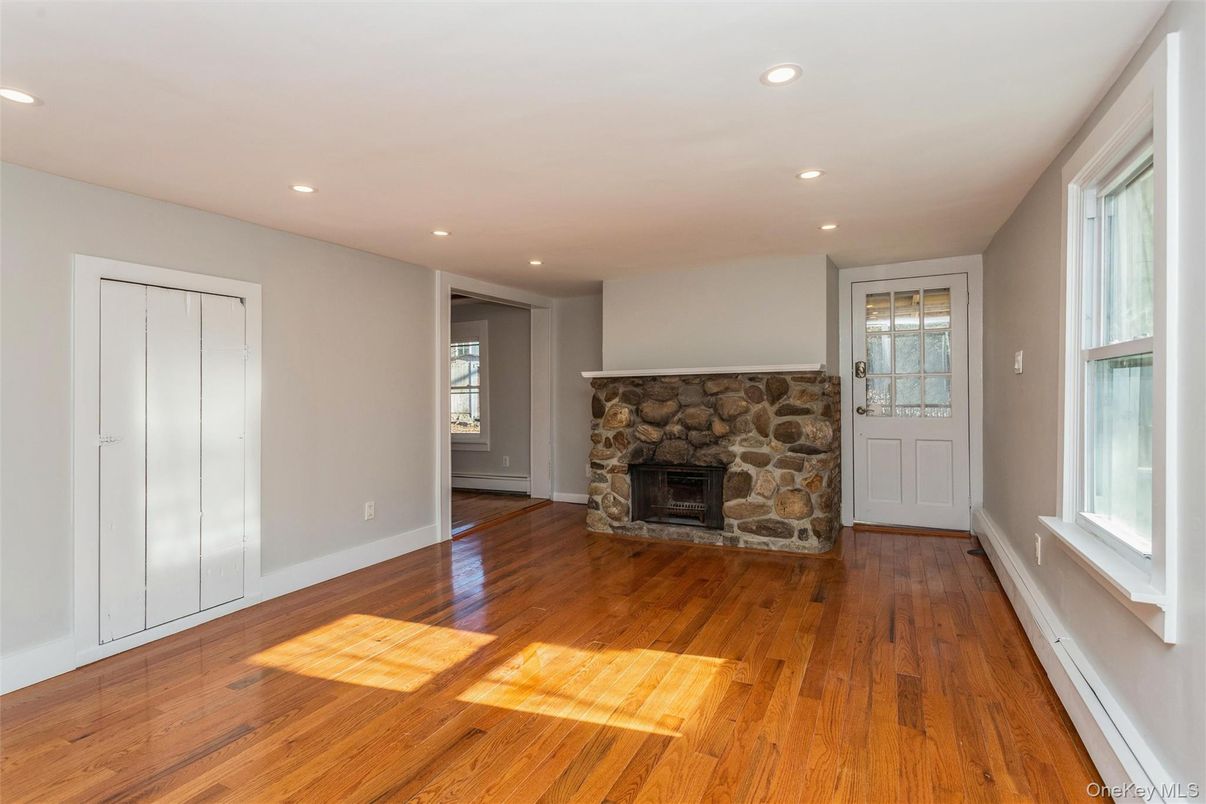 Empty room, Fireplace, Interior, Recessed Lighting, Wood Texture Flooring