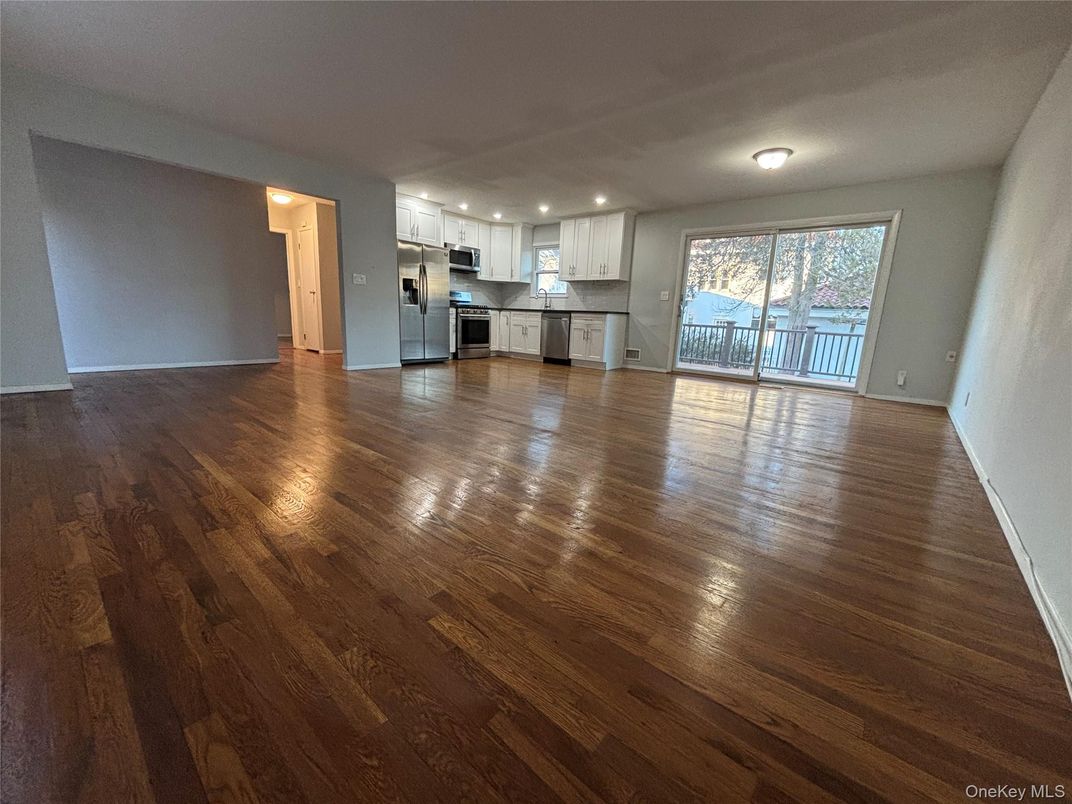 Empty room, Interior, Kitchen, Stainless Steel Appliances, Wood Texture Flooring