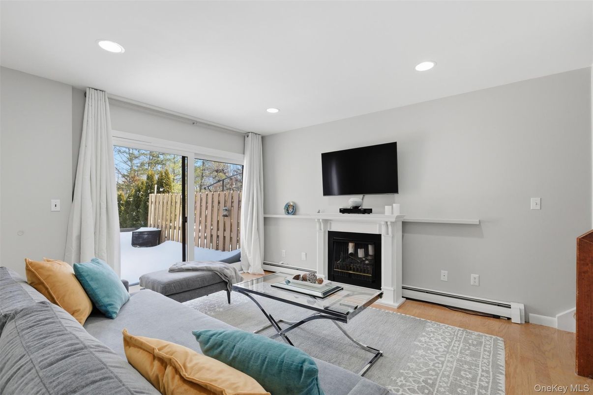 Fireplace, Interior, Living room, Recessed Lighting, Wood Texture Flooring