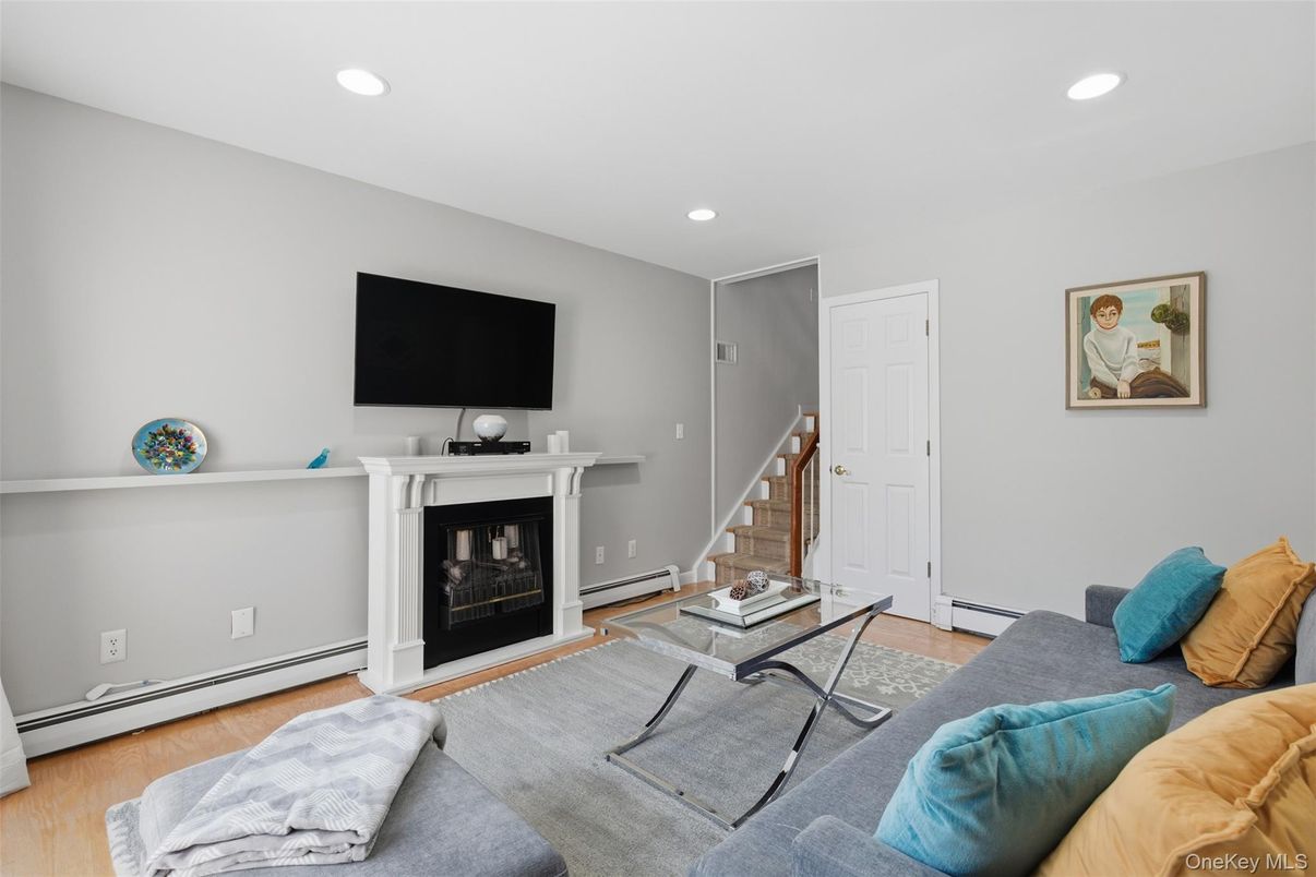 Fireplace, Interior, Living room, Recessed Lighting, Wood Texture Flooring