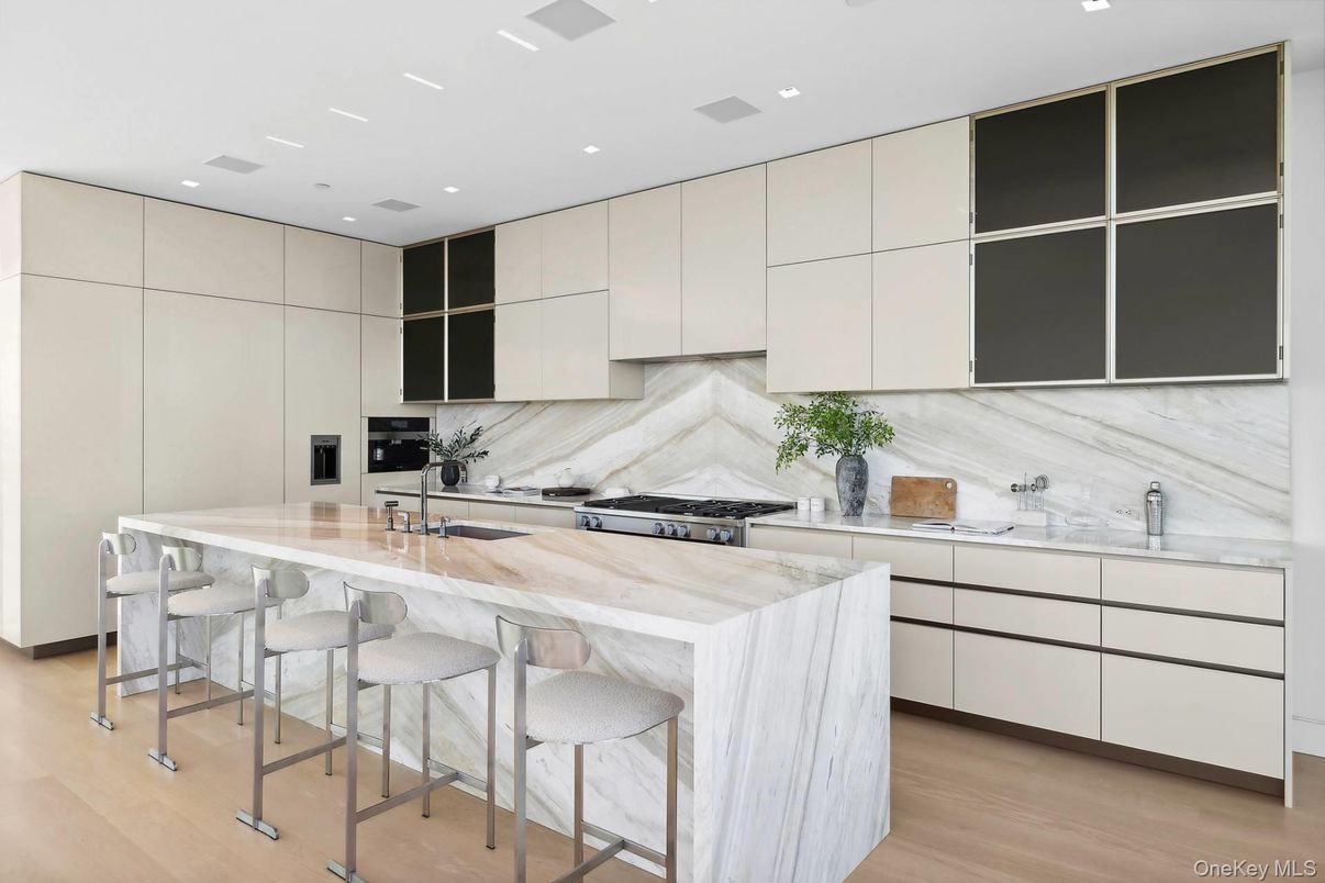 Interior, Kitchen, Marble Walls, Recessed Lighting, Stainless Steel Appliances, Wood Texture Flooring