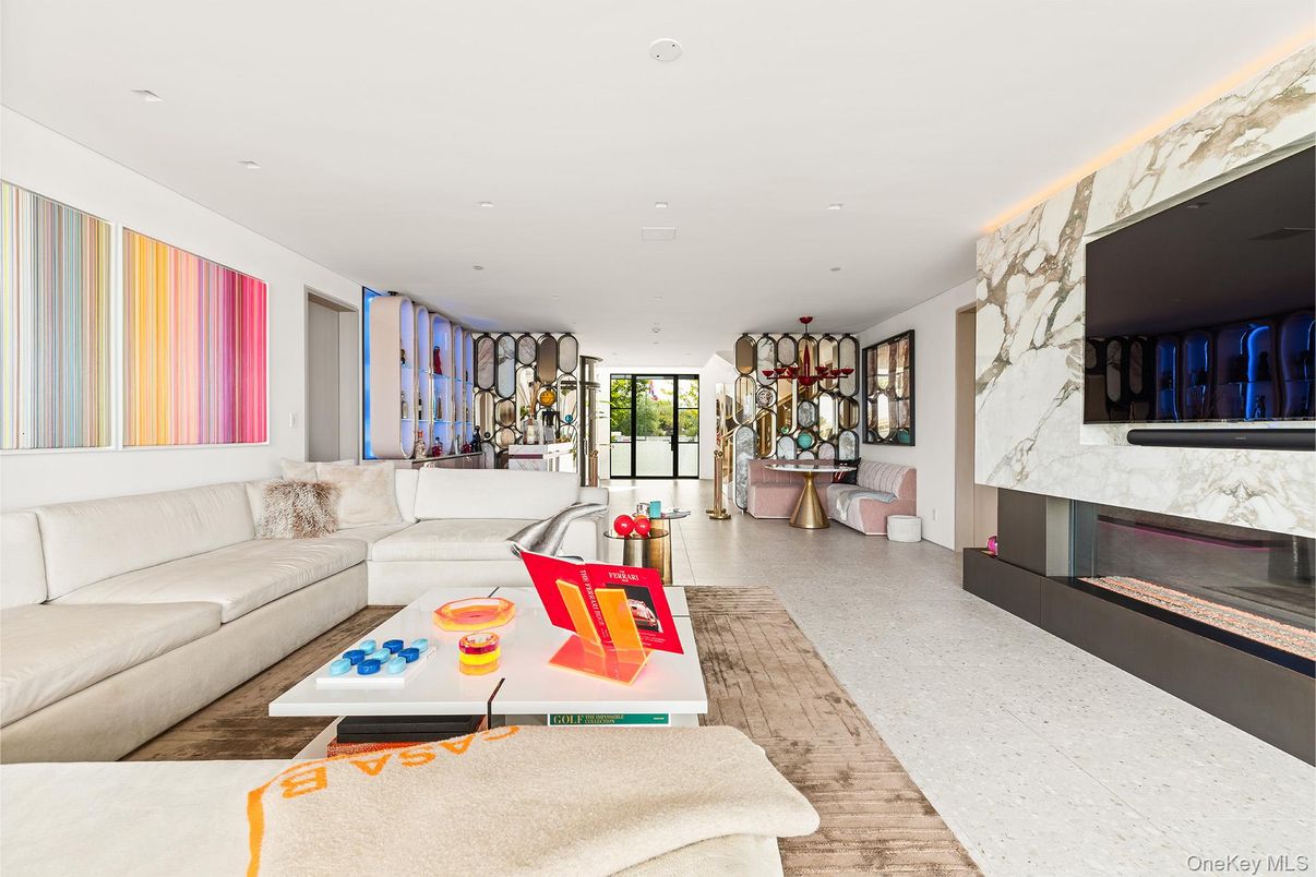 Fireplace, Interior, Living room, Recessed Lighting, Stone Walls, Wood Texture Flooring