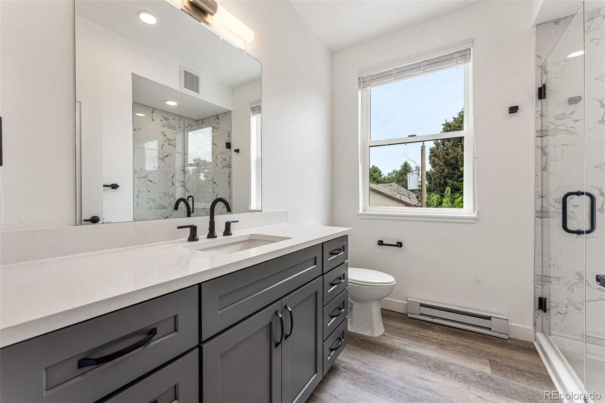 Bathroom, Glass Shower, Interior, Marble Walls, Recessed Lighting, Wood Texture Flooring