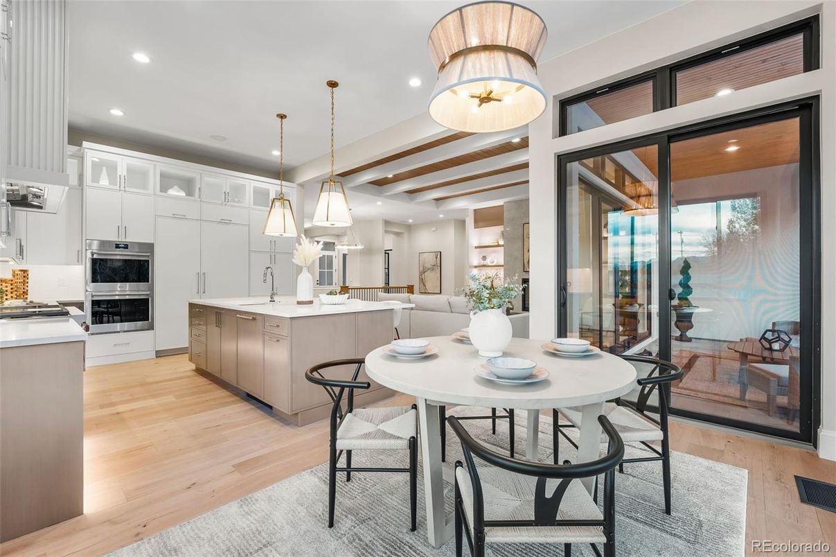 Dining room, Interior, Kitchen, Pendant Lights, Recessed Lighting, Stainless Steel Appliances, Wood Texture Flooring