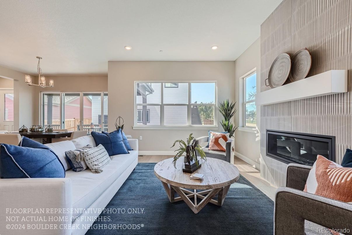 Dining room, Fireplace, Interior, Living room, Recessed Lighting, Wood Texture Flooring